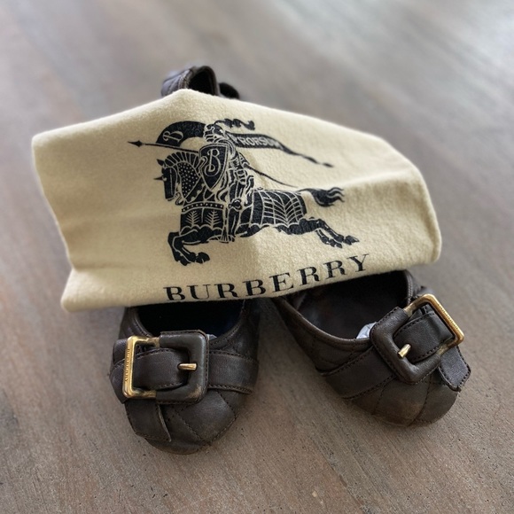 Burberry Shoes - Authentic Burberry Buckle Ballerina Flats with shoe dust bag.